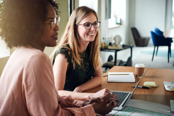 smiling-female-designers-working-at-a-boardroom-ta-2024-09-17-05-54-43-utc-1