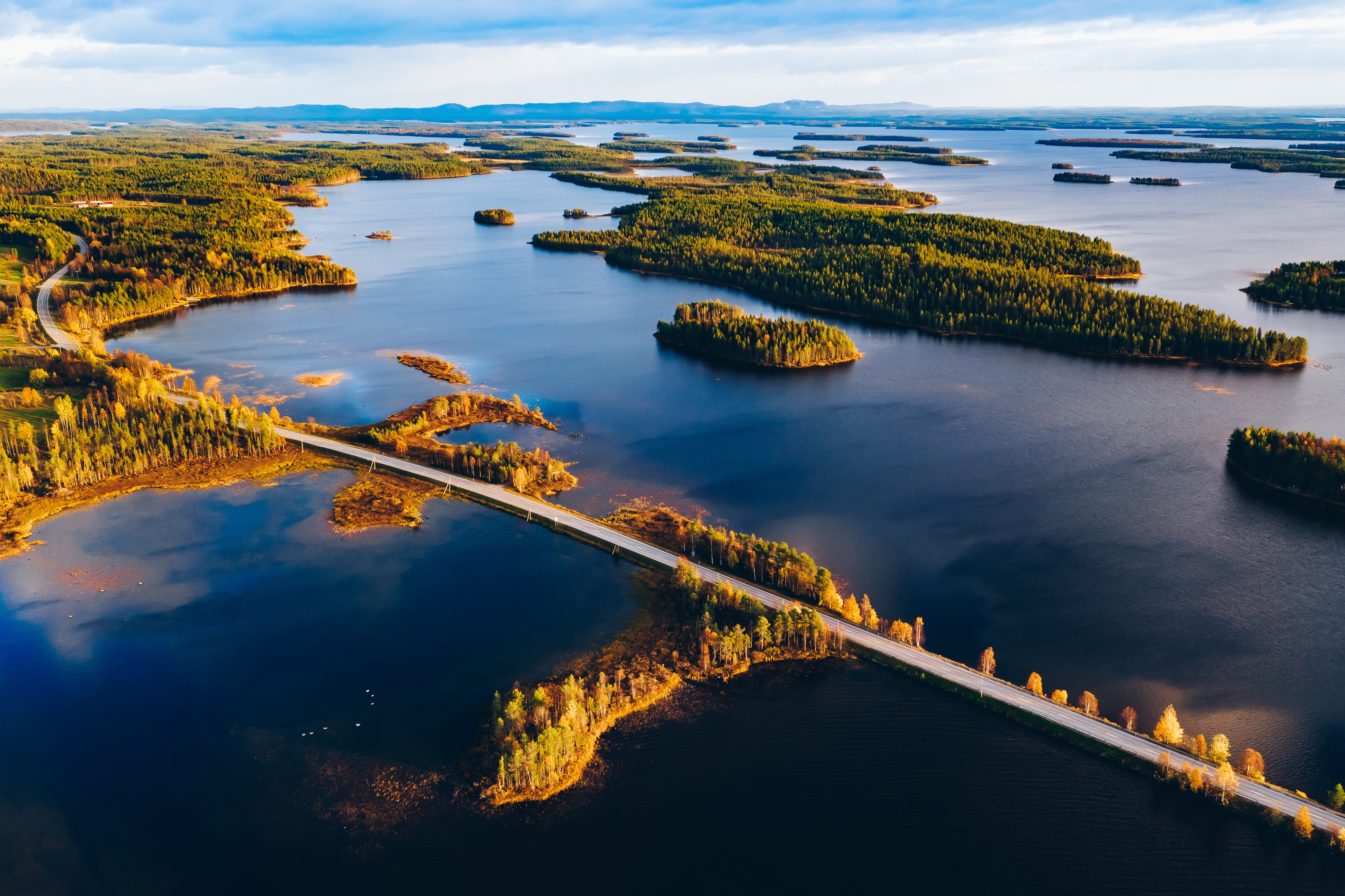 aerial-view-of-road-bridge-across-blue-lakes-with-2026-03-24-14-12-41-utc